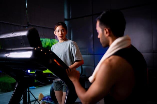 An esports coach working one-on-one with a player, focusing on specific techniques. The scene emphasizes personalized feedback and tailored instruction.