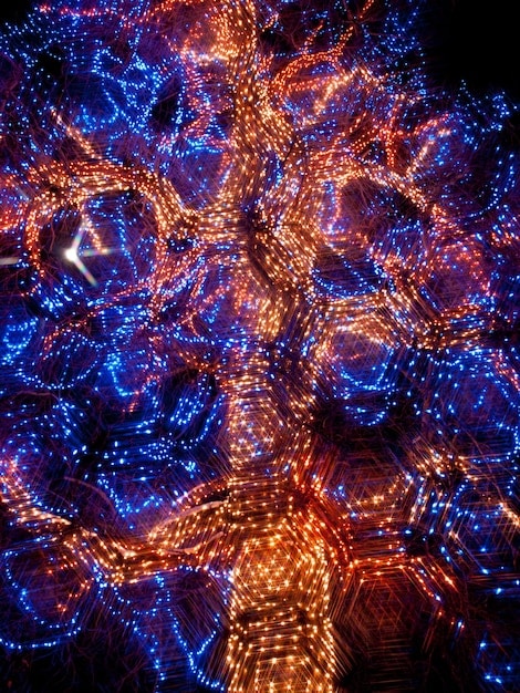An abstract representation of AI neural networks overlaid on a gaming scene, illustrating how AI can enhance resolution and generate frames, with glowing data lines connecting different parts of the image.
