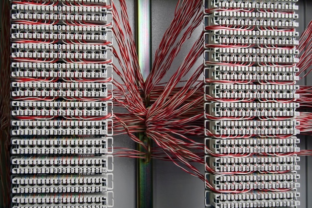 A series of power supply modular cables neatly bundled with Velcro ties, reflecting organized cable management in a modern PC build.