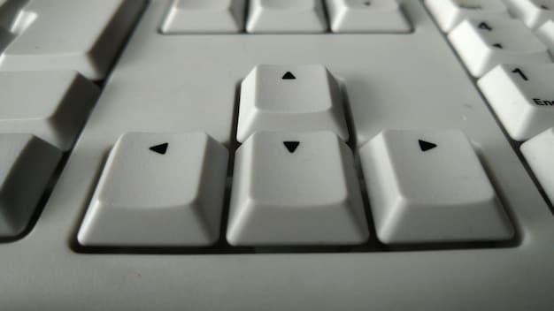 A close-up shot of a split ergonomic keyboard, highlighting the curved key wells and adjustable tilt feature. The focus is on the design elements that promote natural hand and wrist positioning. The caption should emphasize the ergonomic benefits of the keyboard for gamers considering Ergonomic Keyboards: Are They Worth the $200 Investment for Gamers?.