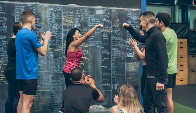 Esports coach intensely reviewing gameplay footage with a US team, pointing out strategic errors and offering advice for improvement. A whiteboard with tactical diagrams is visible in the background.