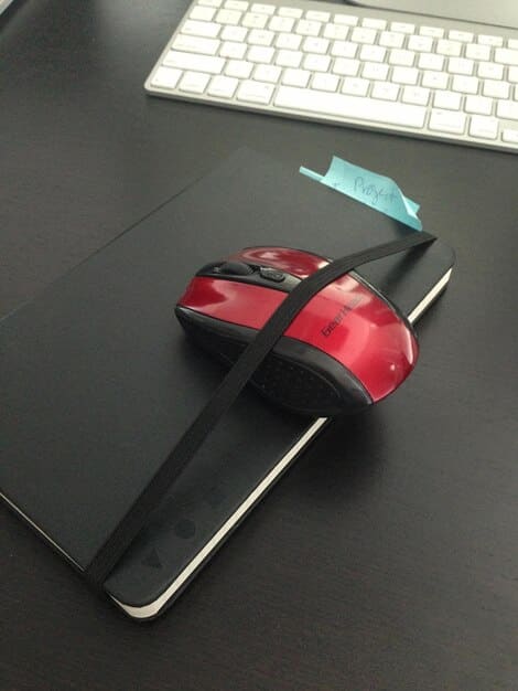 A close-up shot of a high-end gaming mouse with customizable buttons and a high-precision sensor, highlighting its ergonomic design and advanced features. The background is blurred, emphasizing the mouse. This showcases the impact new gaming peripherals have on Esports tournament performance in the US.